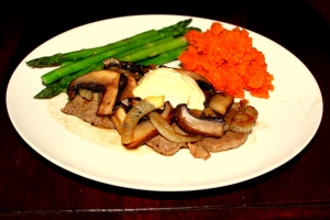 Veal Scallopini with mushroom sauce topped with dijon mayonnaise